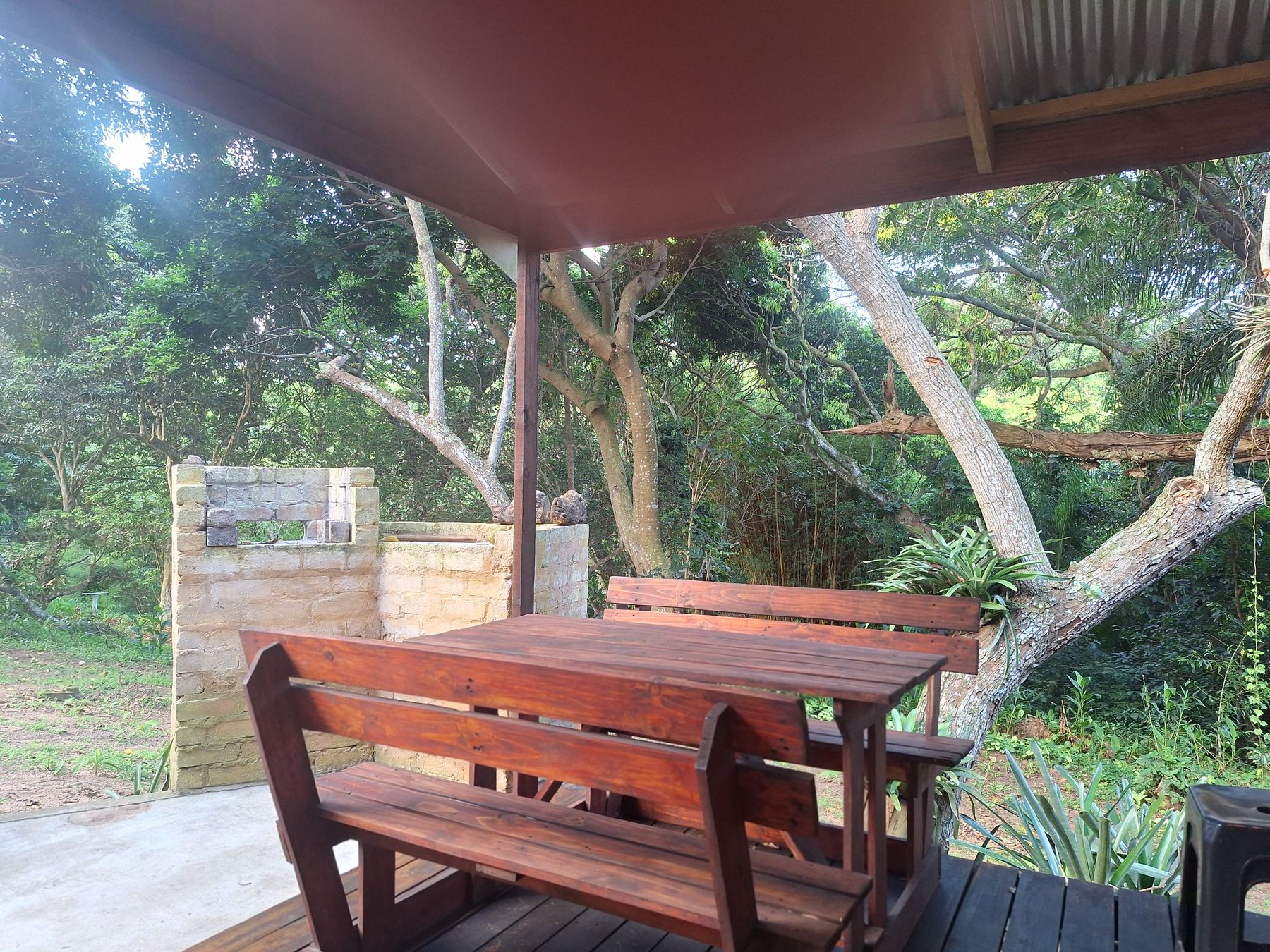 The private braai and garden seating area at Timber Alley